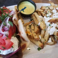 Photo taken at Opa! Authentic Greek Cuisine by Eduardo H. on 5/27/2019