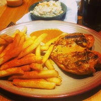 Photo taken at Nando&amp;#39;s by Abi H. on 9/28/2013