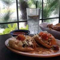 Photo taken at Henry&#39;s Puffy Tacos &amp; Cantina by Maggie C P. on 4/21/2016
