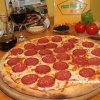Photo taken at Pizza Holiday by Pizza Holiday on 6/28/2015