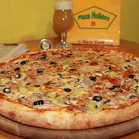 Photo taken at Pizza Holiday by Pizza Holiday on 6/28/2015