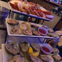 Photo taken at Parc Oasis Oyster Bar by Amy E. on 12/24/2018