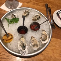Photo taken at Mussel Bar &amp;amp; Grille by Amy E. on 4/26/2019