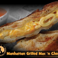 Photo taken at New York Grilled Cheese Co. by New York Grilled Cheese Co. on 10/13/2013