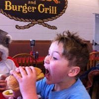 Photo taken at Two Brothers BBQ &amp; Burger Grill by Jonathan E. on 2/22/2013