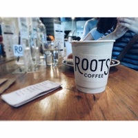 Photo taken at Roots Coffee Roaster by ecOnuizer D. on 11/29/2015