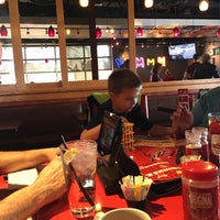 Photo taken at Red Robin Gourmet Burgers and Brews by Christopher K. on 3/31/2018