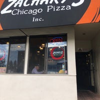 Photo taken at Zachary&#39;s Chicago Pizza by Chris K. on 9/22/2019