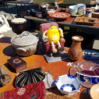 Photo taken at Alameda Point Antiques Faire by Eunju T. on 3/6/2022