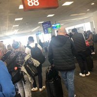 Photo taken at Gate F21 by Emily H. on 4/29/2019