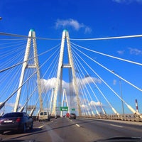 Photo taken at Bolshoy Obukhovsky Bridge (Cable-stayed bridge) by Виктория П. on 5/1/2013