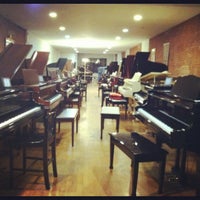 Photo taken at Beethoven Pianos by Alexandra J. on 11/28/2012
