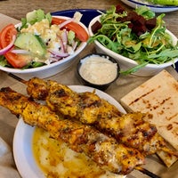 Photo taken at Kyma Greek Cuisine Restaurant by Winnie F. on 6/23/2022