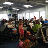 Photo taken at Gate C12 by Shawn H. on 6/21/2013