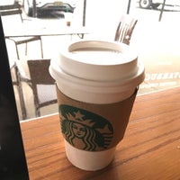 Photo taken at Starbucks by Sam A. on 3/29/2018