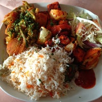 Foto diambil di Bhangra Beat Indian Cuisine oleh Vasily M. pada 6/21/2013