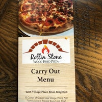 Photo taken at Rollin Stone Wood Fired Pizza by Jonathan M. on 3/24/2018