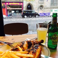 Photo taken at Nando&amp;#39;s by Jayoung R. on 8/2/2015