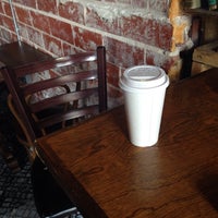 Photo taken at The Coffee Cat by ML F. on 6/19/2014
