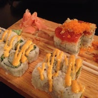 Photo taken at Inoko Sushi Express by Adam H. on 1/20/2013