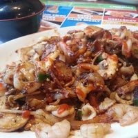 Photo taken at bd&amp;#39;s Mongolian Grill by Maria D. on 4/2/2013