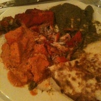 Photo taken at Tulsi Indian Cuisine by Devon H. on 10/20/2012