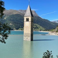 Photo taken at Reschensee / Lago di Resia by Antje K. on 9/18/2021