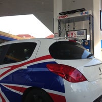 Photo taken at Esso Tampines Ave 9 by ,7TOMA™®🇸🇬 S. on 9/28/2012
