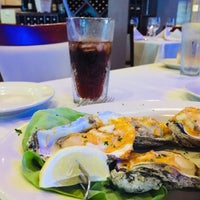 Photo taken at Opus Ocean Grille by M on 6/7/2019