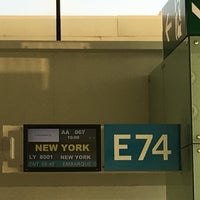 Photo taken at Gate E74 by Mónica A. on 12/8/2016