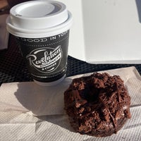 Photo taken at Revolution Doughnuts &amp;amp; Coffee by Darion M. on 10/16/2022