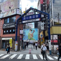 Photo taken at 神田駅西口商店街 by Katsumi E. on 7/8/2022