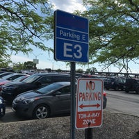 Photo taken at Economy Parking Lot E by Simon C. on 5/27/2018