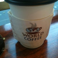 Photo taken at World Coffee by Lou C. on 10/2/2013