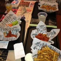 Photo taken at Wingstop by Lindsey I. on 3/13/2013