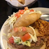 Photo taken at Henry&amp;#39;s Puffy Tacos &amp;amp; Cantina by Sam L. on 7/27/2018