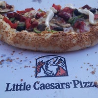 Photo taken at Little Caesars Pizza by Figen A. on 8/10/2013