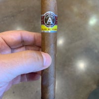 Photo taken at Smoky&amp;#39;s Tobacco and Cigars by Emerson A. on 7/24/2019