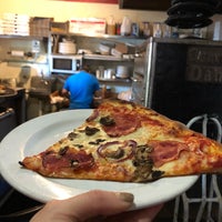 Photo taken at Belltown Pizza by Ashley W. on 8/31/2018