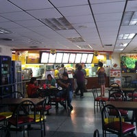 Photo taken at Church&amp;#39;s Chicken by Carlos G. on 5/1/2012
