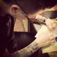 Photo taken at Rock-A-Billy Tattoo &amp;amp; Piercing Studio by Lauren B. on 8/19/2012