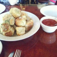Photo taken at Crust Pizzeria and Ristorante by Mike R. on 6/18/2012