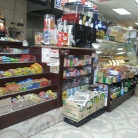 Photo taken at Best Deli Grocery Grill by sarah s. on 8/1/2012