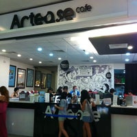 Photo taken at Artease Café by Angela T. on 8/13/2011