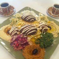 Photo taken at Mazah Mediterranean Eatery by Carol C. on 5/14/2011