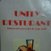 Photo taken at UNITY RESTAURANT (SOULFOOD) by chella k. on 2/24/2012