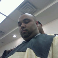 Photo taken at Dominguez Barbershop by Julio R. on 4/5/2012