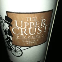 Photo taken at Upper Crust Pizzeria by Sara on 4/4/2012