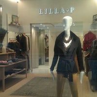 Photo taken at Lilla P Boutique by Erin M. on 10/3/2011