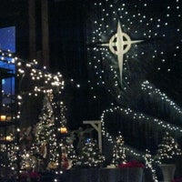 Photo taken at Holy Family Parish by Sue P. on 12/25/2011